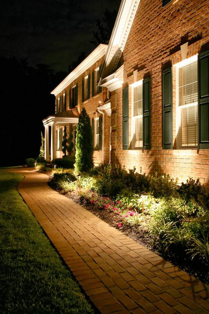 Low voltage LED pathway lighting on a brick walkway in Fayetteville NC